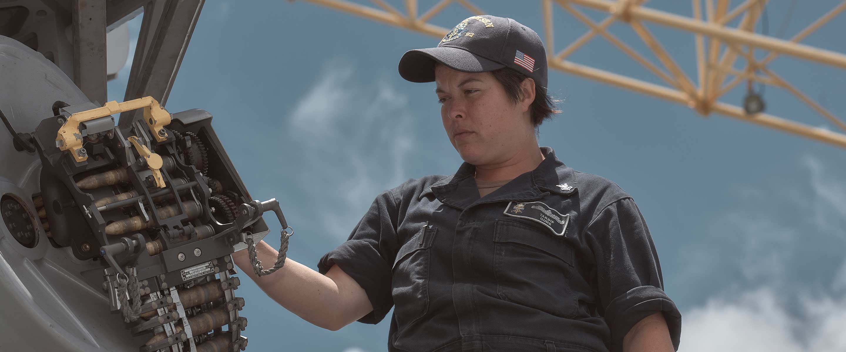 Natalie Tardif runs an equipment check on a U.S. Navy vessel