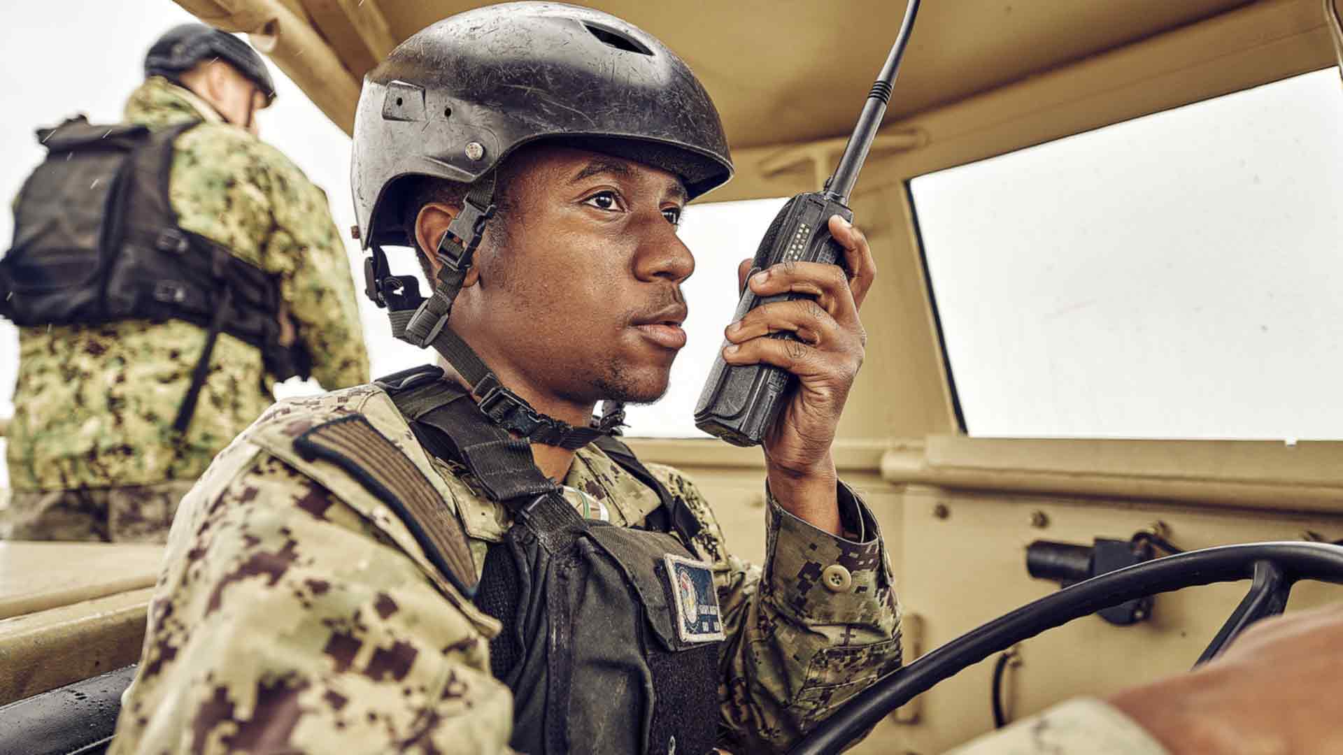 Navy Reserve Sailor in vehicle.