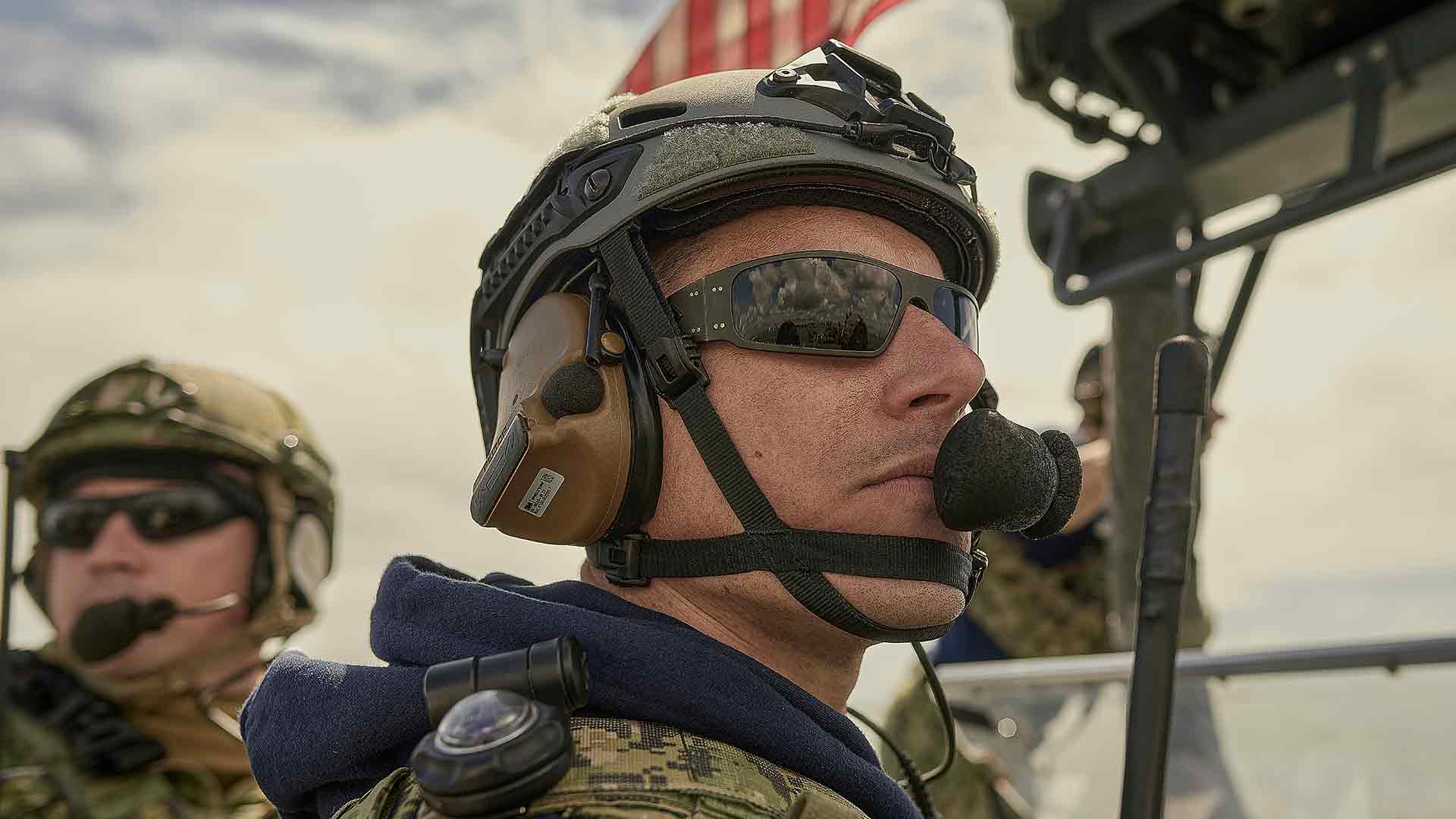 US Navy SWCC Sailor Nick O’Sullivan stands with his Special Warfare Combat Crewman team.